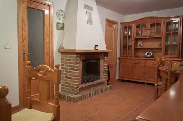 Chimenea del salón de la primera planta | Casa Amparo