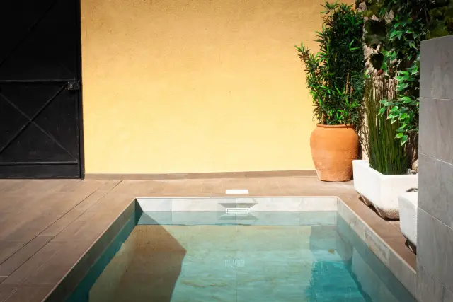 Un rincón de la piscina